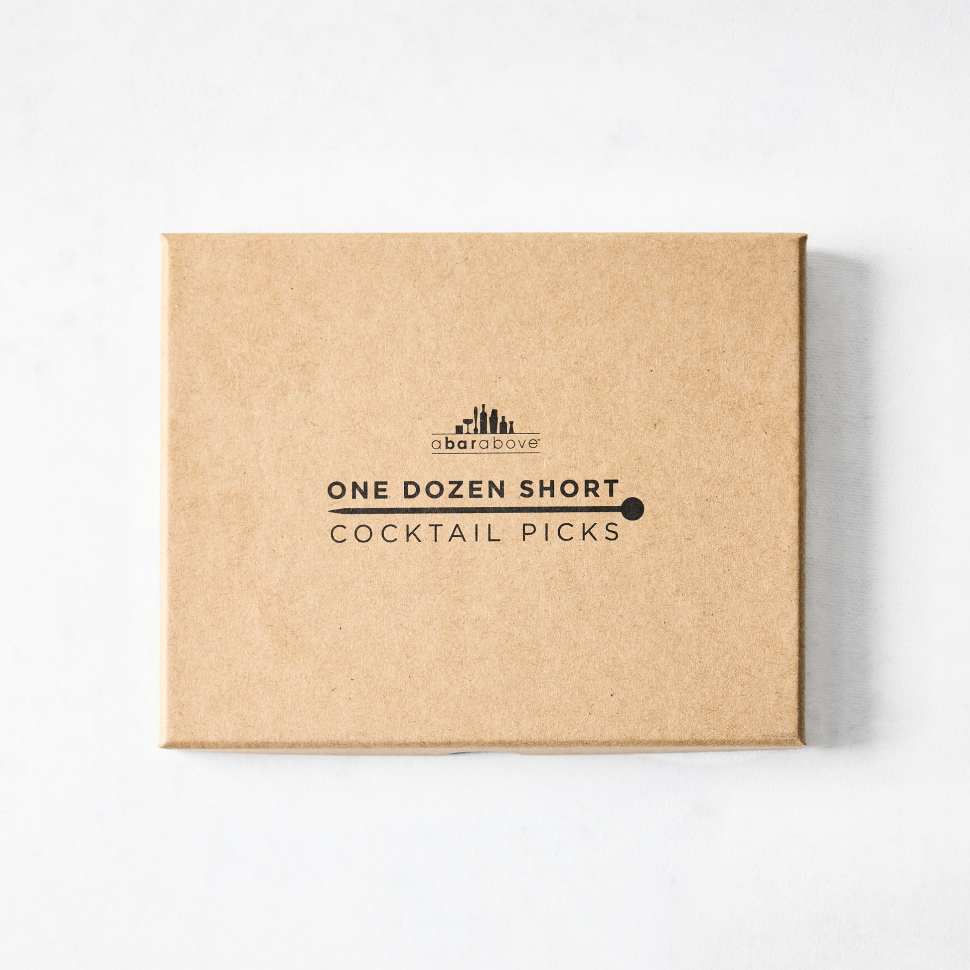Brown cardboard box for "One Dozen Short Cocktail Picks" by A Bar Above, with black text and logo.