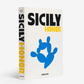 White linen hardcover book "Sicily Honor" with black, yellow, and blue text and a blue prickly pear design.