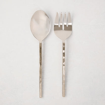 Silver forged 2-piece serving set with hammered stainless steel spoon and fork.