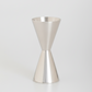HG Silverplate Double Jigger, a sleek, gleaming two-sided measuring tool for cocktails.