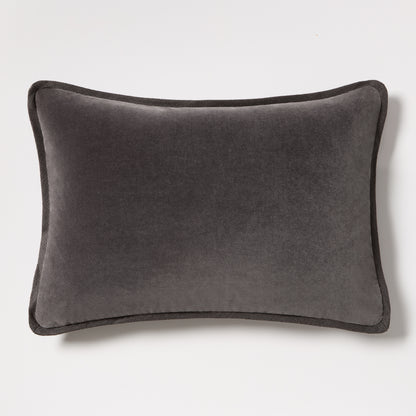 Slate grey tonal reversible velvet and linen lumbar pillow, 20"L x 14"H, with piped edges.