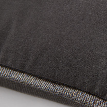 Slate grey tonal reversible velvet and linen lumbar pillow, 20"L x 14"H, with a hidden zipper.
