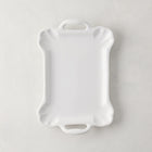 Small Alessia white ceramic handled serving platter with a delicate, vintage-inspired design and detailed edge.