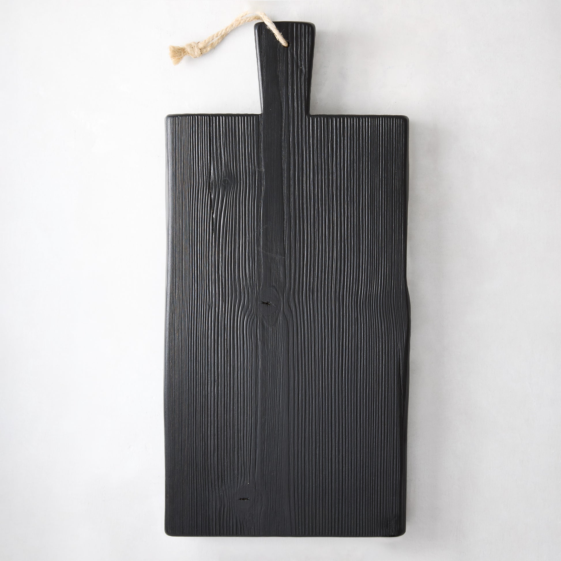 Small black reclaimed wood Brasserie serving plank with handle and rope loop.