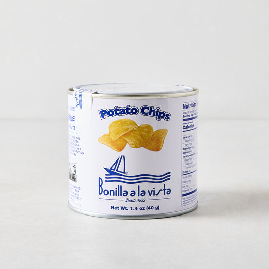 Small white Bonilla a la Vista potato chip tin with blue text and chip illustration.
