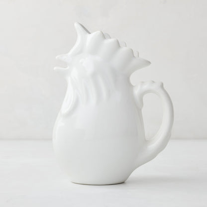 White ceramic rooster pitcher, 6.75"H, with a glossy glaze and detailed comb.