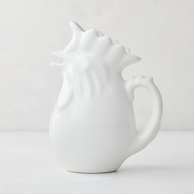 White ceramic rooster pitcher, 6.75"H, with a glossy glaze and detailed comb.