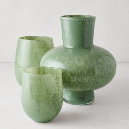 Handblown opaque green glass barrel vase, 5.3"H x 3.9"W, with two smaller matching vases.