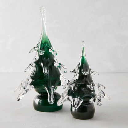 Two handblown green glass Christmas trees, one 7"H, with clear glass branches.