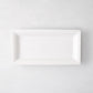 Small Lucca rectangular serving platter, white ceramic, 17"L x 9"W, modern sleek design.
