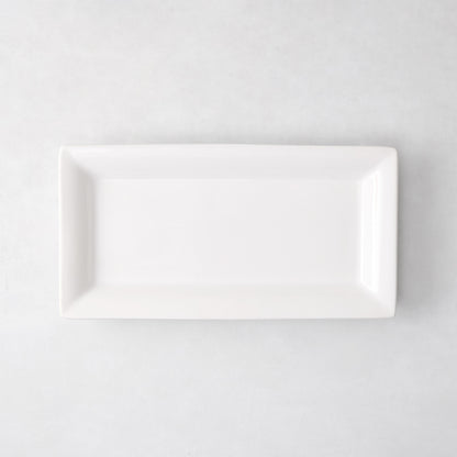 Small Lucca rectangular serving platter, white ceramic, 17"L x 9"W, modern sleek design.