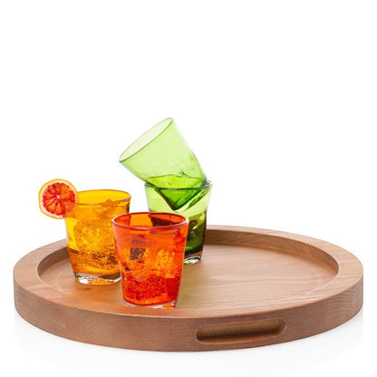 Small natural reclaimed pine wood serving tray with cutout handles, holding colorful glasses.