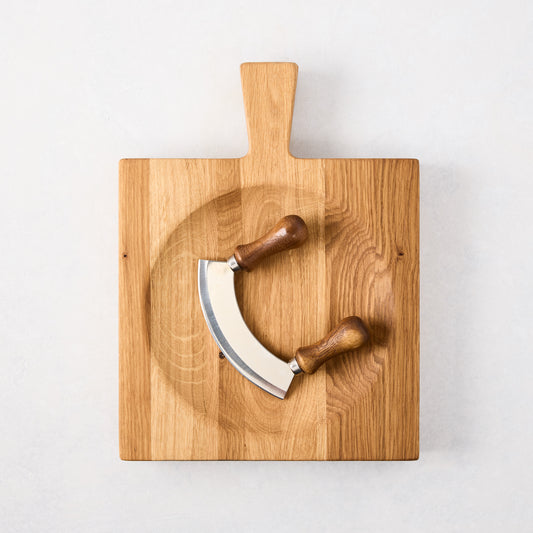 Small reclaimed oak wood cutting board bowl with mezzaluna blade, 13"L x 9.8"W.