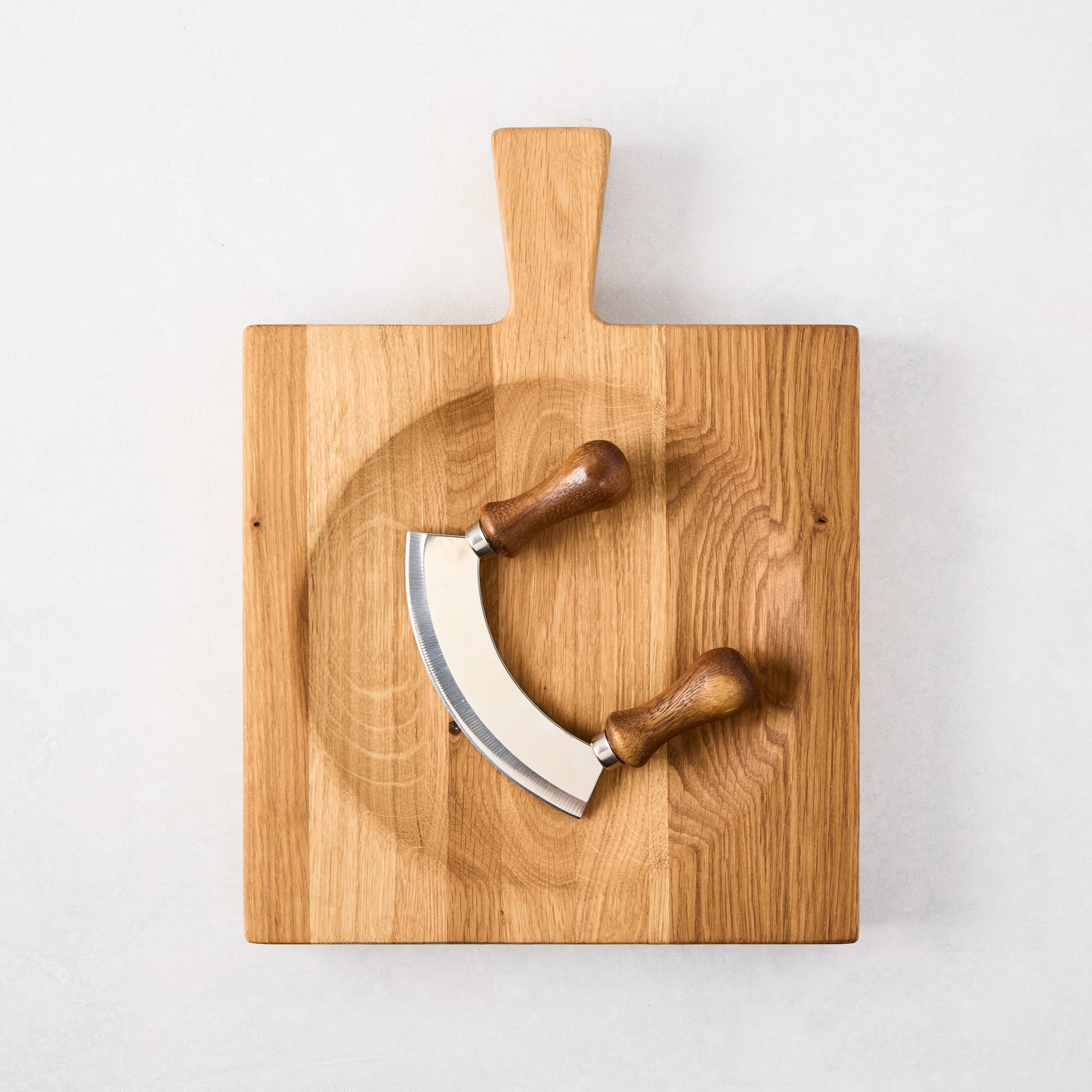 Small reclaimed oak wood cutting board bowl with mezzaluna blade, 13"L x 9.8"W.