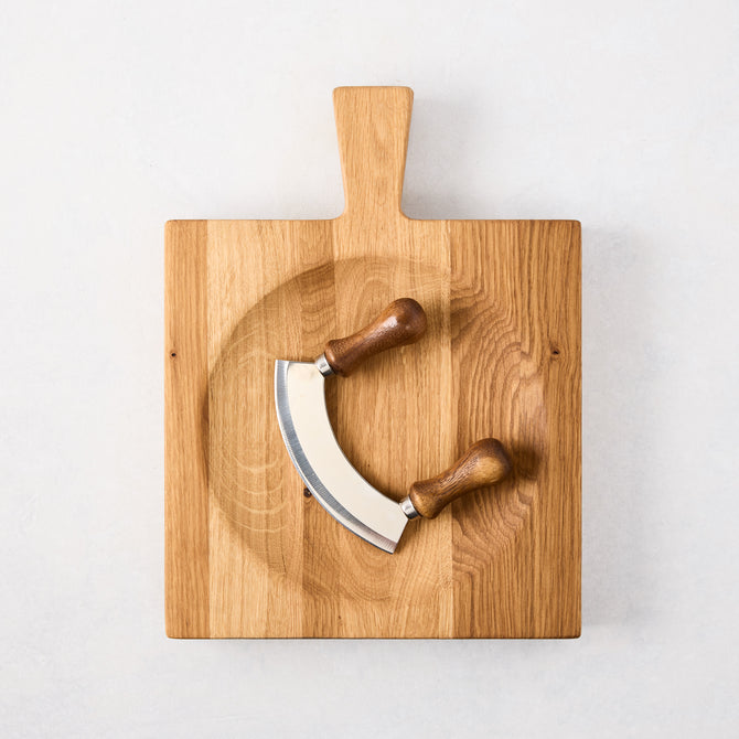 Small reclaimed oak wood cutting board bowl with mezzaluna blade, 13"L x 9.8"W.