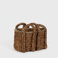 Small rectangular woven water hyacinth basket with braided handles.