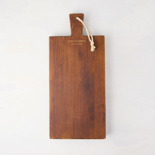 Small Saddle Wood Serving Plank, dark brown European pine, with a handle and rope hanger.