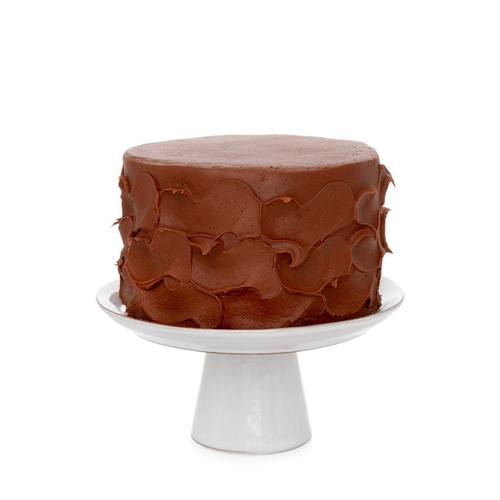 Small Stone Cake Stand, 8"Dia x 4"H, cool grey-white hand-glazed terracotta, with chocolate cake.