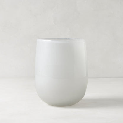 Small opaque white handblown glass barrel vase, 5.3"H x 3.9"W.