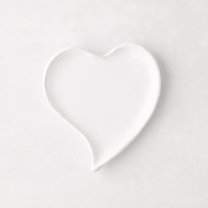 Small white ceramic heart-shaped dish, handmade in Italy.