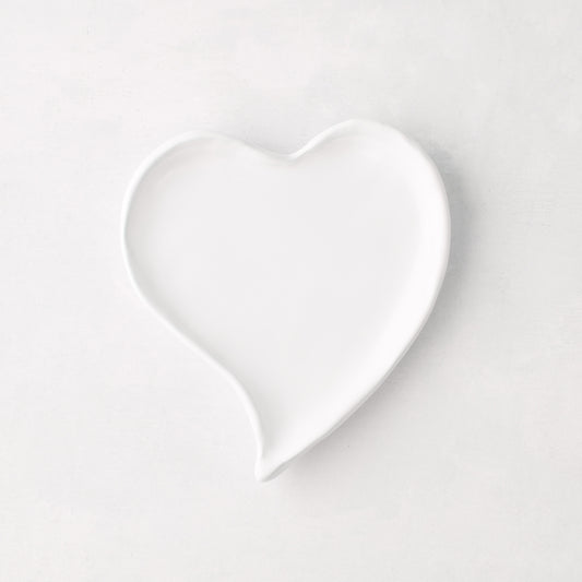 Small white ceramic heart-shaped dish, handmade in Italy.
