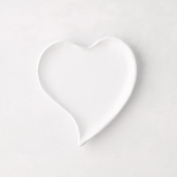 Small white ceramic heart-shaped dish, handmade in Italy.