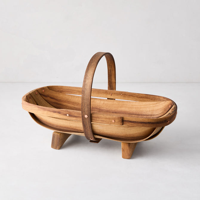 Handcrafted small wooden garden trug made of Myrtlewood with a handle, feet, and copper nails.