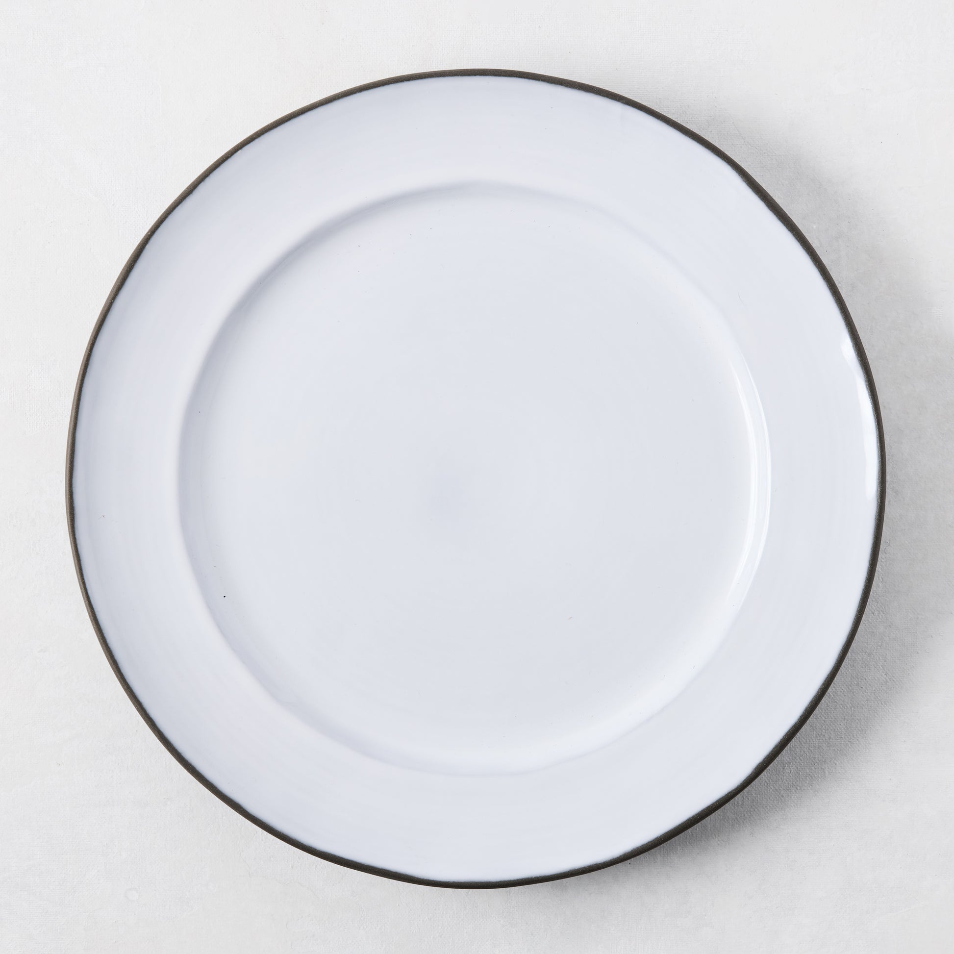 Smoke Grey Stoneware Dinner Plate, 11.3"Dia, with dark grey rim and light grey glazed center.