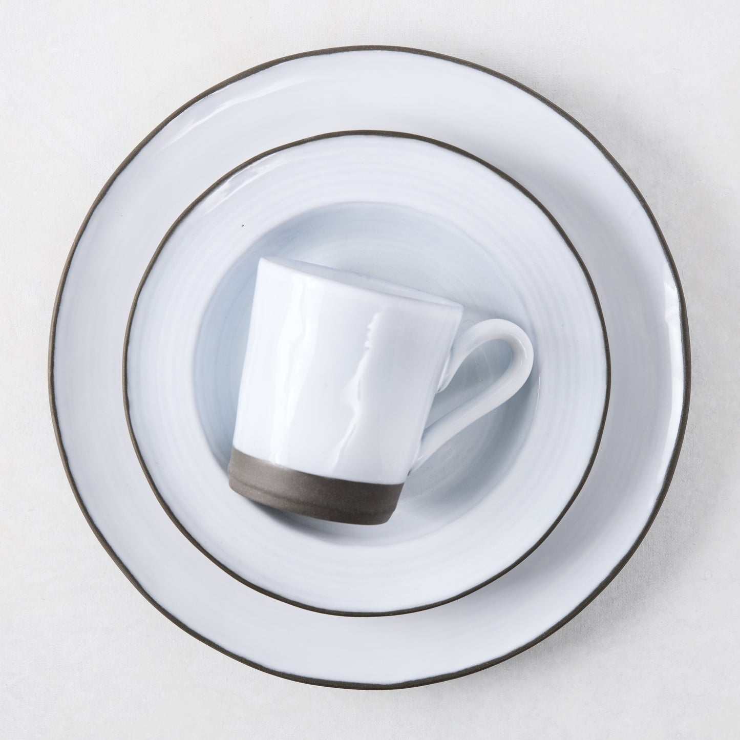 Smoke Grey Stoneware Salad Plate, 8.3"Dia, with a two-toned grey glaze and dark rim.