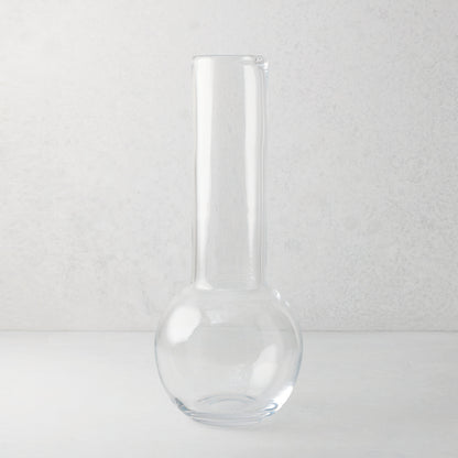 Sofia 17.5"H clear mouth-blown glass vase with a round base and tall, narrow neck.