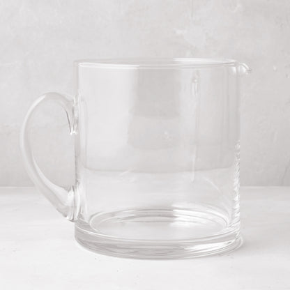 Clear Soho Short Glass Pitcher, wide design with handle and pour spout.