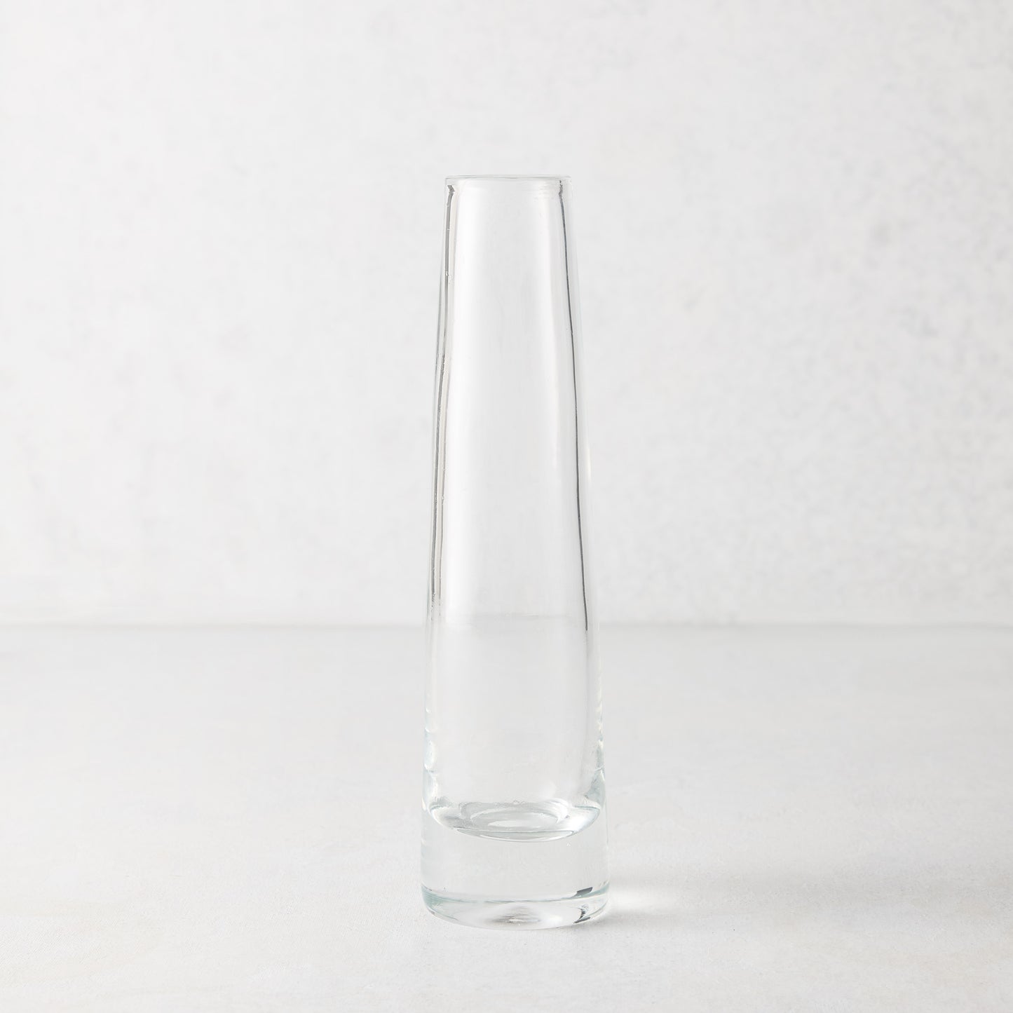 Solifleur Large Glass Bud Vase, clear mouth-blown glass, 8.27"H, on a white background.