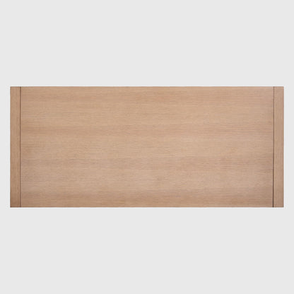 Solstice extendable oak dining table, top-down view, showing natural wood grain and sleek rectangular design.