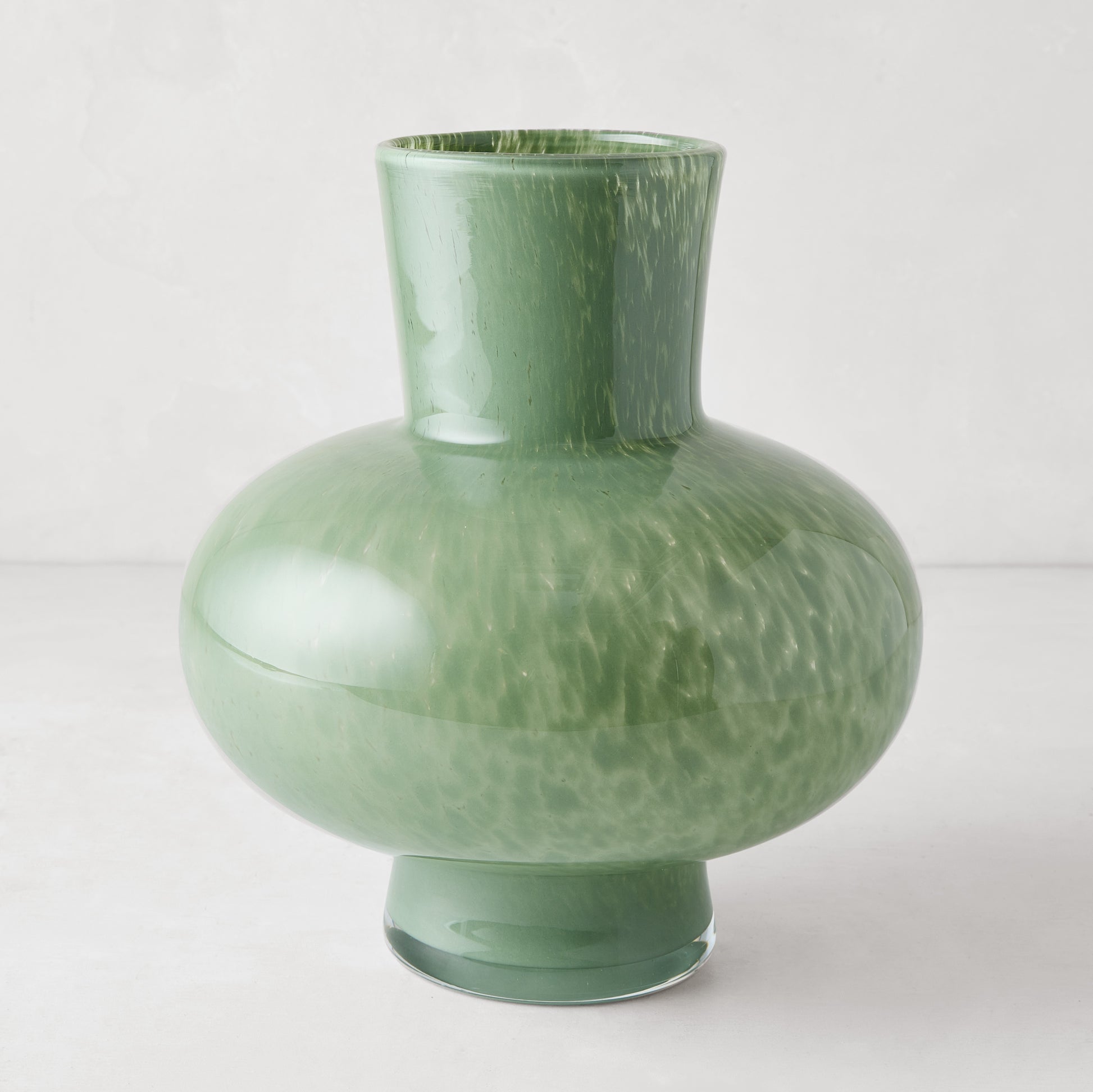 Oversized Sonia Green Glass Vase, handblown, with an opaque finish and unique speckled texture.
