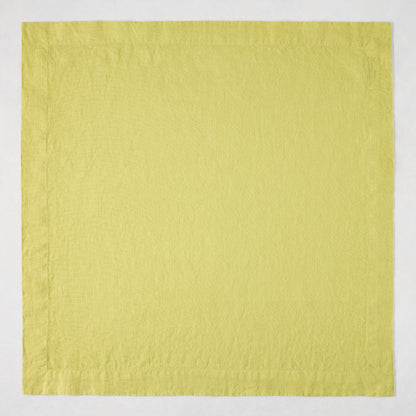 HG Sour Apple hand-dyed 22-inch square linen napkin with mitered corners.