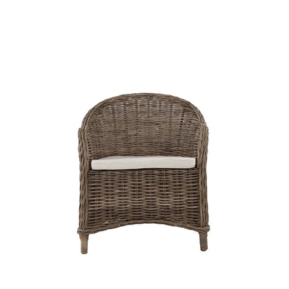 Southern French Arm Chair, natural rattan with light cushion, 25"L x 22"W x 32.5"H.