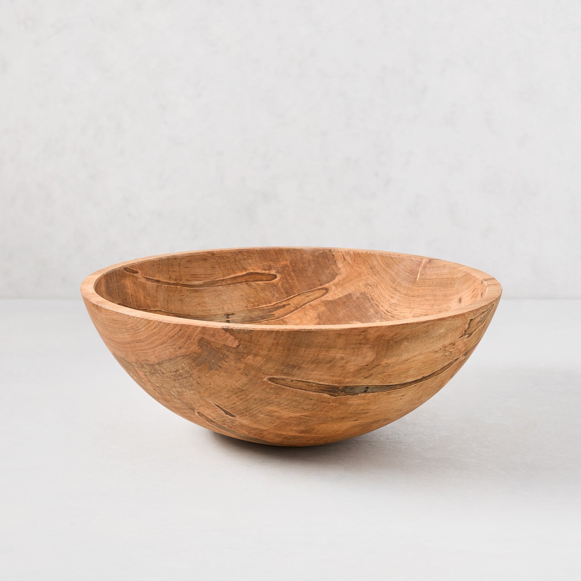 15" spalted maple wood bowl with unique natural patterns and warm brown tones.