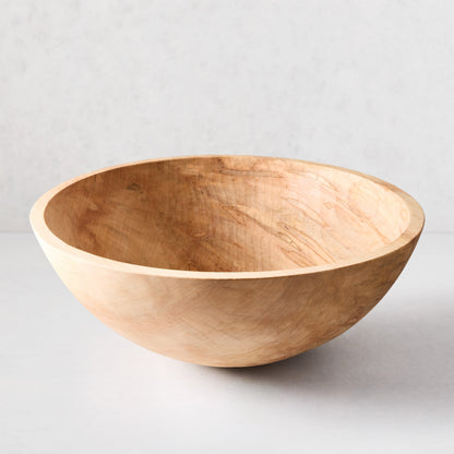 Large, light brown spalted maple wood bowl, 21 inches in diameter, with unique natural grain patterns.