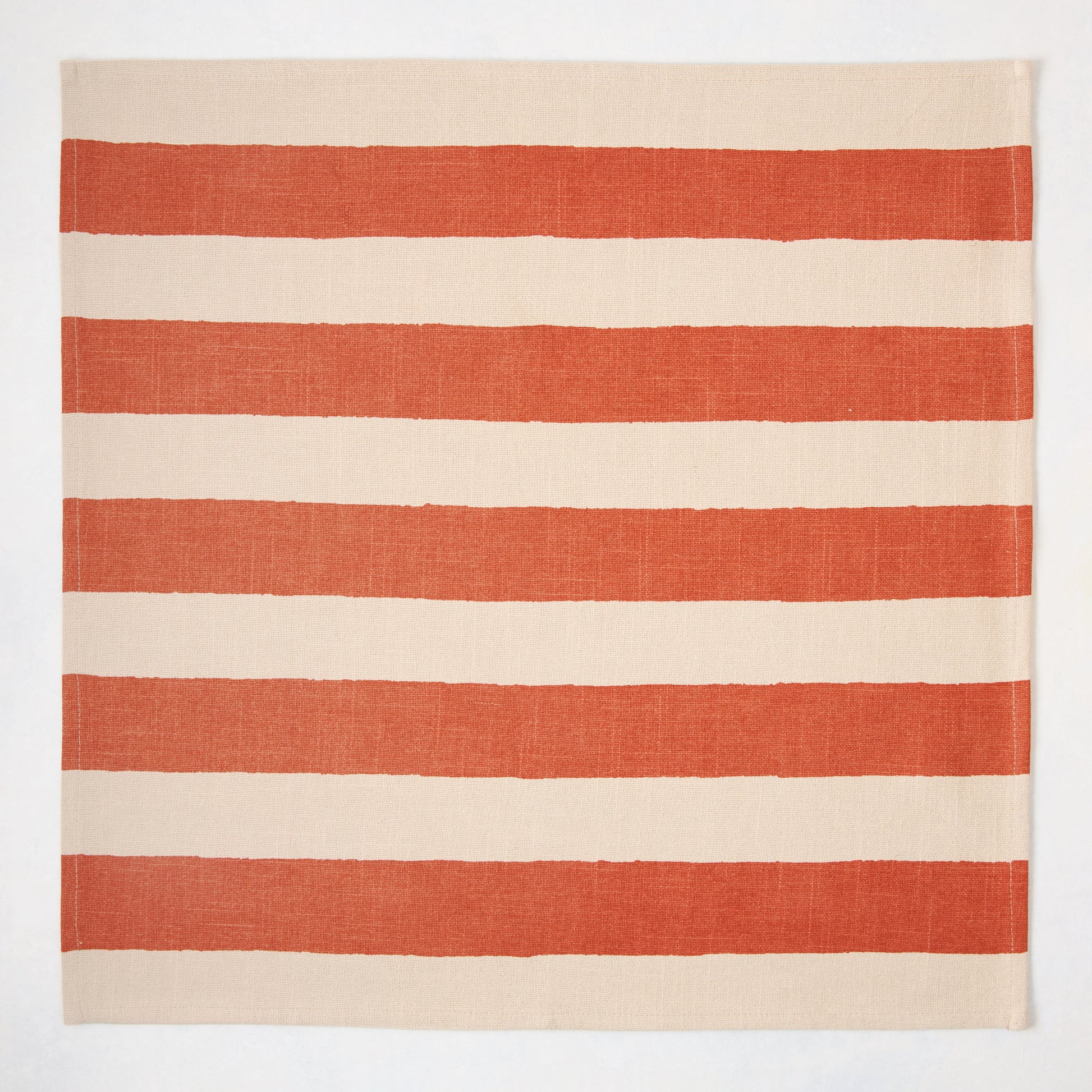 Spice Orange Hampton Stripe Natural Cotton Napkin, 22" square, with wide orange stripes on a khaki base.