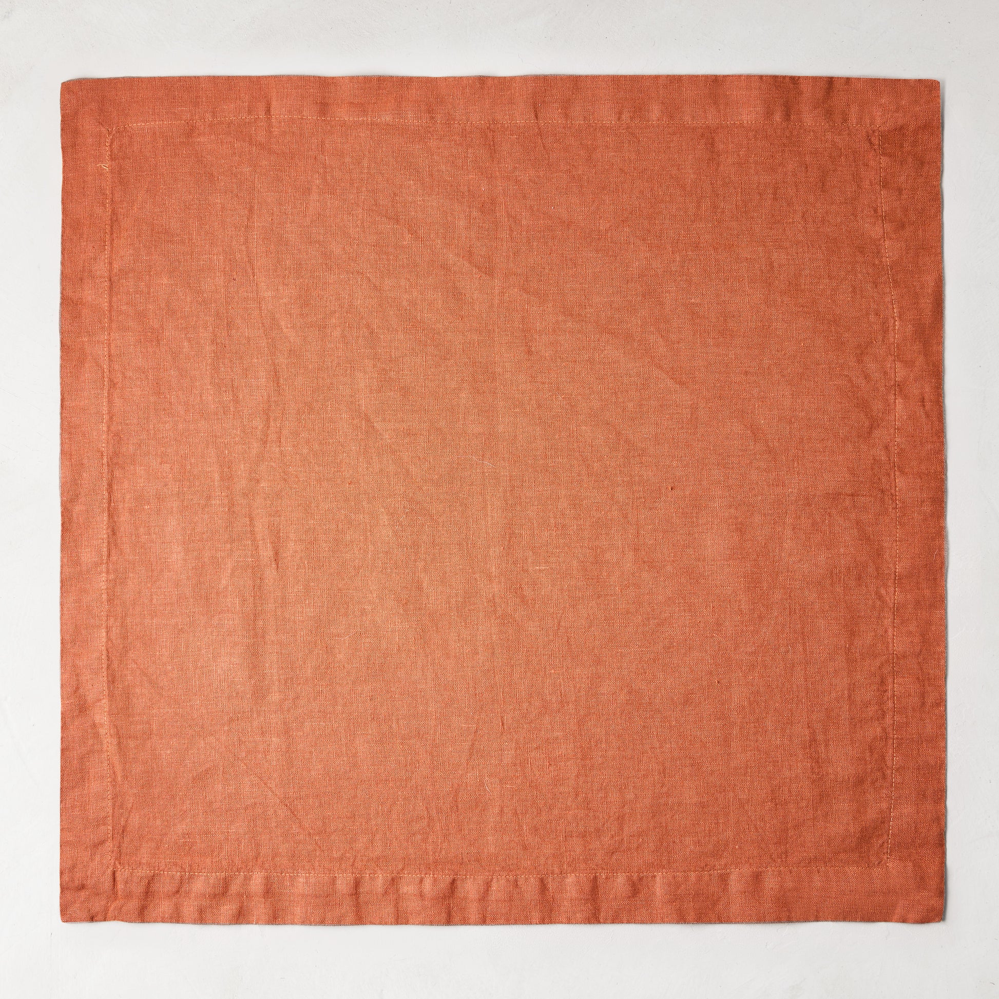 Spice HG Hand-Dyed Linen Napkin, 22" square, with mitered corners.