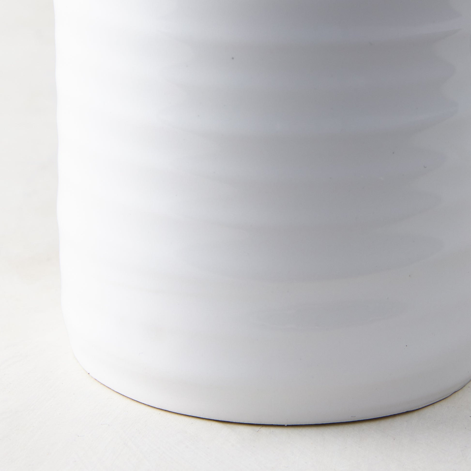 White ceramic Spiral Mug with subtle horizontal ridges, 12oz, handmade in Italy.