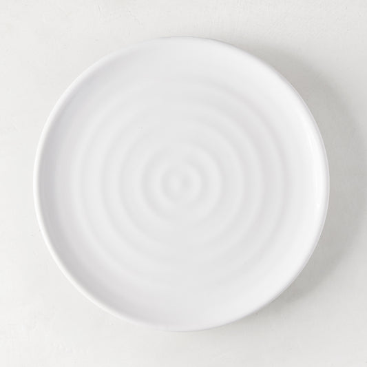 White ceramic spiral salad plate, 9" diameter, handmade in Italy.