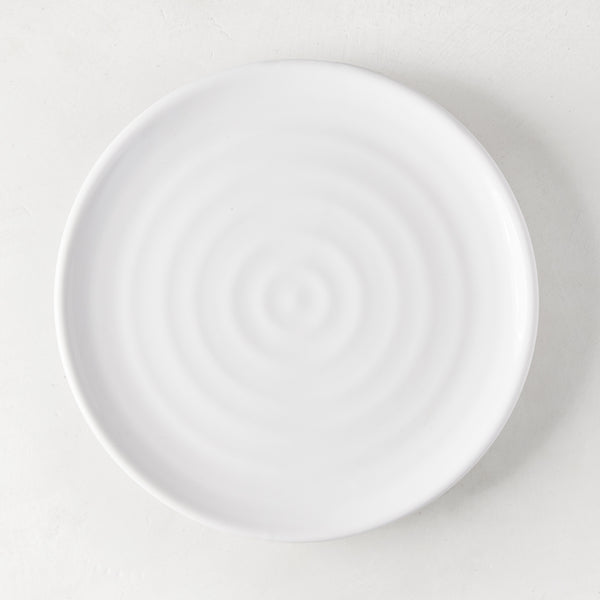 White ceramic spiral salad plate, 9" diameter, handmade in Italy.
