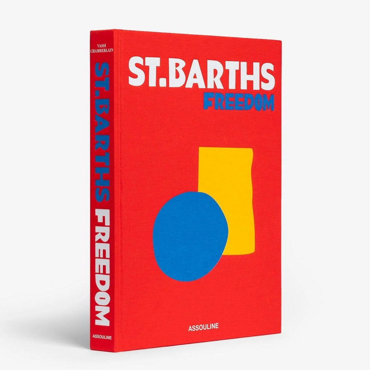 Red linen hardcover book, "St. Barths Freedom" title, with blue circle and yellow rectangle graphic.