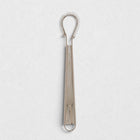 Stainless steel 8"L x 2"W mini whisk with a coiled spring head and loop handle.