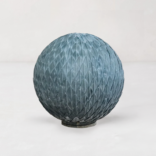 Steel Metal Garden Leaf Ball, dark gray, made from layered, hand-welded leaves.