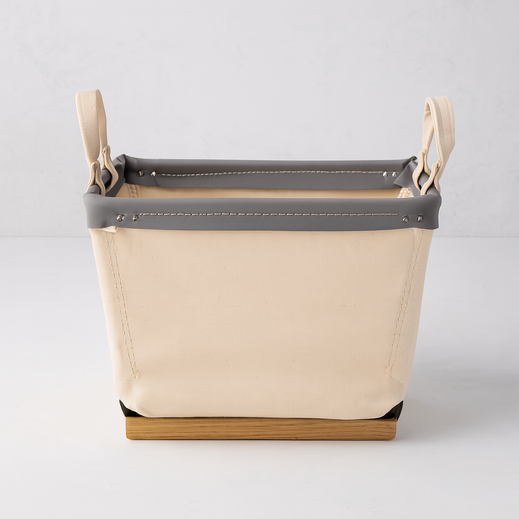Steele 1-Bushel Canvas Carry Basket with natural canvas, gray trim, and wood runners.