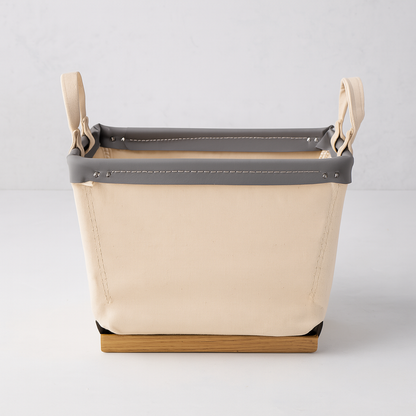 Steele 1-Bushel Canvas Carry Basket with natural canvas, gray trim, and wood runners.