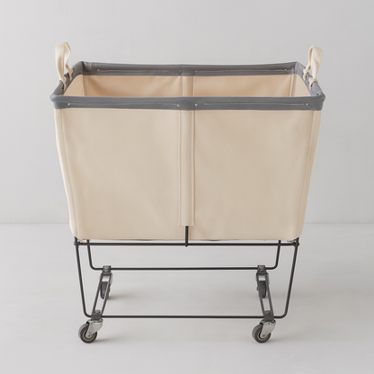 Steele 3-Bushel Canvas Elevated Rolling Laundry Hamper with cream canvas and dark trim on a black steel frame.