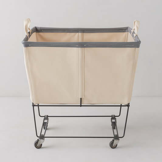 Steele 3-Bushel Canvas Elevated Rolling Laundry Hamper with cream canvas and dark trim on a black steel frame.